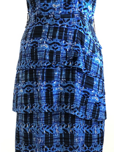 Vintage 90s rayon dress in a blue multi-tone print, with short kimono sleeves, 3-tiered skirt, centre back zipper and belt loops. This dress falls at knee-midi length. 