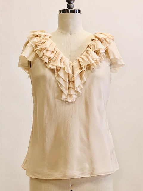 Romantic cream silk top with ruffled neckline and delicate silk flared sleeves; lined with a chiffon-like fabric. 