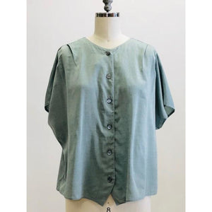 Vintage loose-fitting box shape top with button-down front, short kimono sleeve with interesting shoulder pleat detail. Sage green fabric with slight sheen. Worn like a one-size fits all style; great for tucking into linen trousers or shorts. 