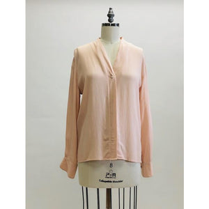 Romantic soft blush pink long-sleeve rayon blouse with v-neck line and hidden button-down front placket. Pairs beautifully with vintage denim or linen pants or skirt, or with dress pants for the office. 