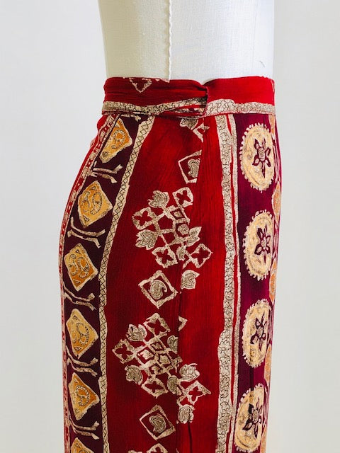 Gorgeous viscose wrap skirt in very unique red tribal print. Shapes beautifully with wrap style and waist ties. 