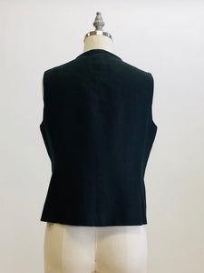 Classic black Irish linen box-style vest top with front welt pockets.  Collarless high rounded neckline. 