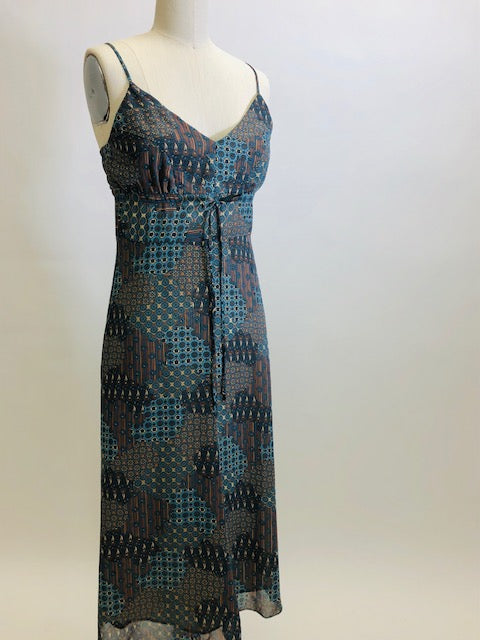 Viscose crepe lightweight A-line midi dress, lined with adjustable spaghetti straps and empire bust style in a teal blue & brown paisley print. Versatile style for casual or even dressier occasions - pairs sweetly with a cardigan, and strappy kitten heels. 