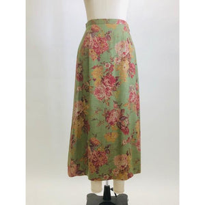 Truly beautiful & feminine midi length green skirt with rose garden print, lined with side zipper. Lightweight wool blend with a slightly A-line silhouette. As a transitional season piece, pairs nicely with your favorite pair of ankle boots. 