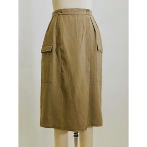 Knee length linen/viscose skirt in a dark khaki and olive tone with interesting snap front wrap overlap at waist, pin tucks at waistband and cargo pockets. Uniquely designed skirt. 