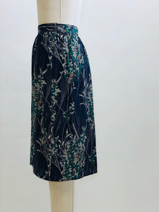 Elegant and timeless vintage knee length, lined skirt with subtle gathering at waistband and back zipper closure. 