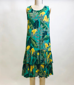 Beautiful vintage Alfred Sung rayon sleeveless dress with 20s inspired low waist ruffle hem and straight silhouette. This dress has a gorgeous tropical print of green and yellow florals. Label Sung Sport by Alfred Sung.