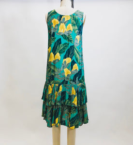 Beautiful vintage Alfred Sung rayon sleeveless dress with 20s inspired low waist ruffle hem and straight silhouette. This dress has a gorgeous tropical print of green and yellow florals. Label Sung Sport by Alfred Sung.