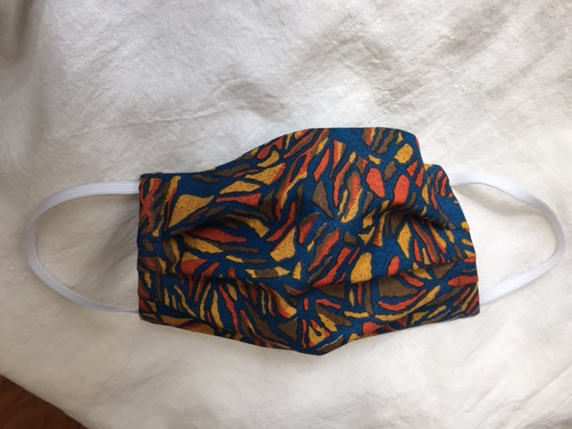 This is a double-layer face mask made of unused deadstock / remnant fabric in a beautiful vintage print. A pleated style that is washable and reusable. Made in Canada. 