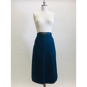 Adorable A-line denim skirt that falls below knee with unique wrap on the back with attached denim belt, and cute welt pocket on back. Such a sweet skirt for the vintage girl.  