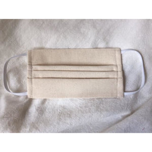 This is a triple-layer eco-friendly face mask made of 100% unbleached organic muslin cotton with elastic loops. Great alternative for those of us with skin sensitivities to bleaches and dyes. A pleated style that is washable and reusable. Made in Canada. 