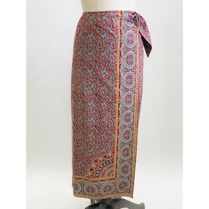 Vintage Ralph Lauren wrap midi cotton skirt with side waist tie in a vibrant paisley print of blues, reds and light orange, accented by a striking border. 